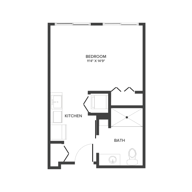 An assisted living studio suite floor plan with an open living/bedroom space