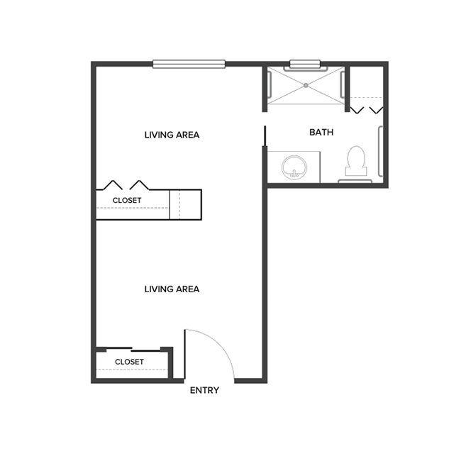 A memory care studio suite floor plan with an open living/bedroom space and a bathroom.
