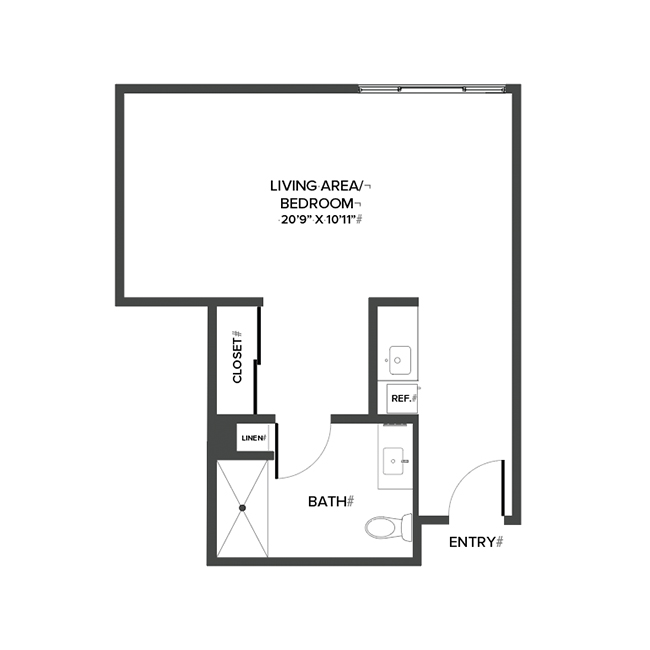 A memory care studio suite floor plan with an open living/bedroom space and kitchenette.