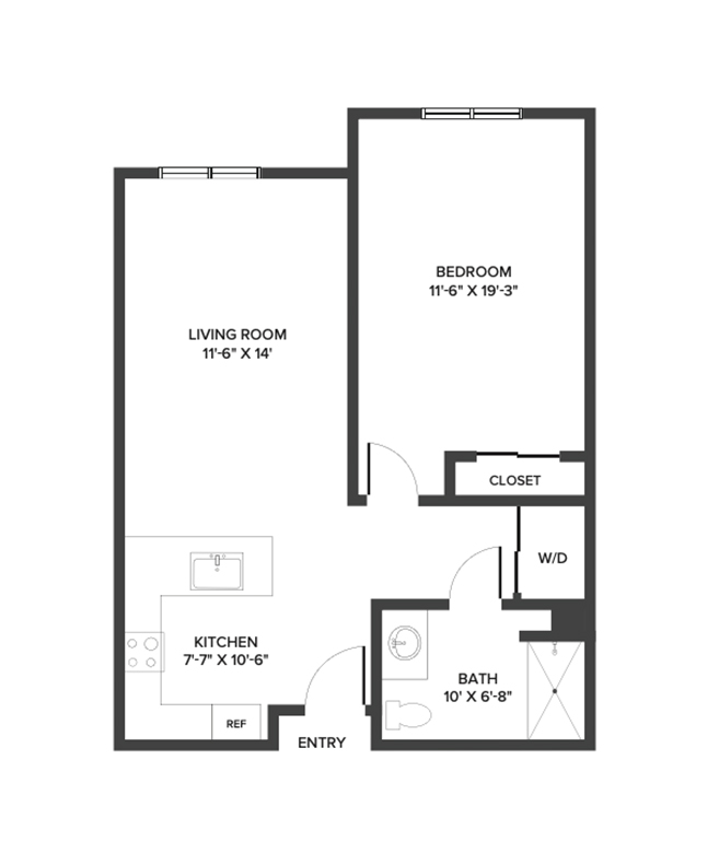 An assisted living suite floor plan with one bedroom, a bathroom, and approximately 718 square feet.