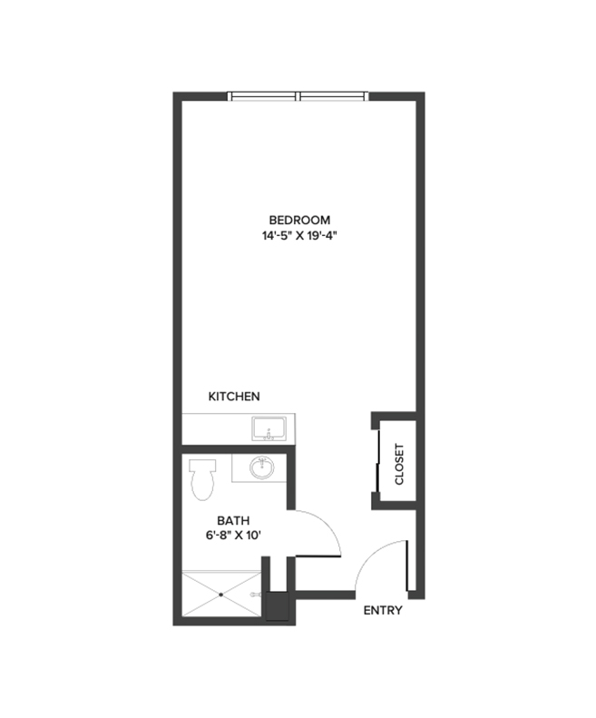 An assisted living studio suite floor plan with an open living/bedroom space and kitchenette. Approximately 394 square feet.