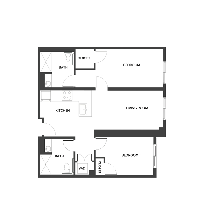 An assisted living suite floor plan with two bedrooms and two bathrooms.