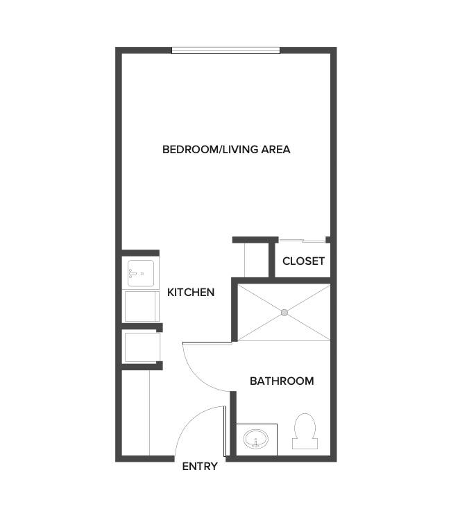 A memory care studio suite floor plan with an open living/bedroom space and kitchenette.