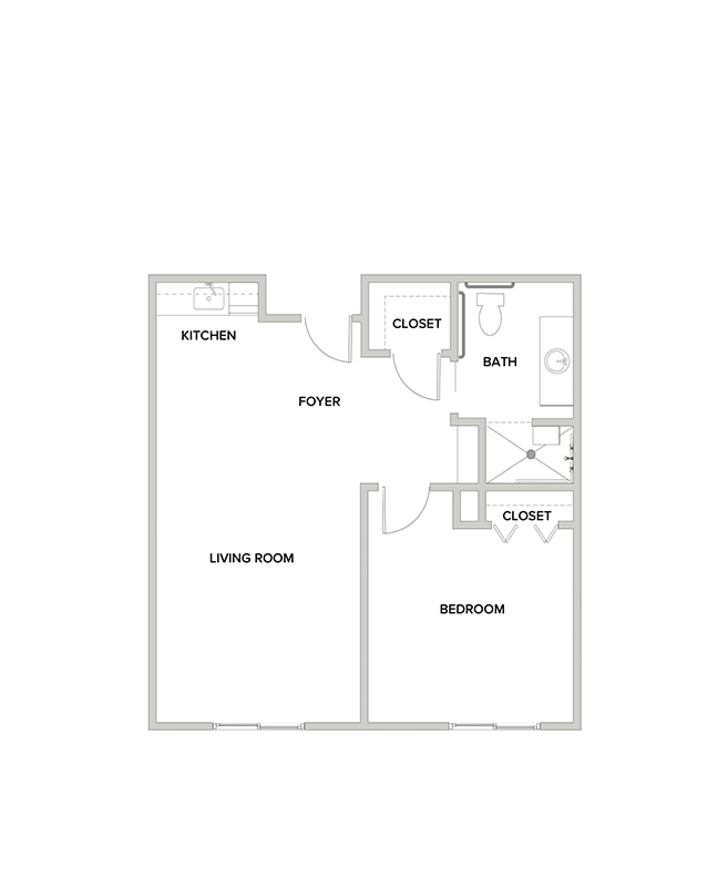 An assisted living suite floor plan with one bedroom and a bathroom.
