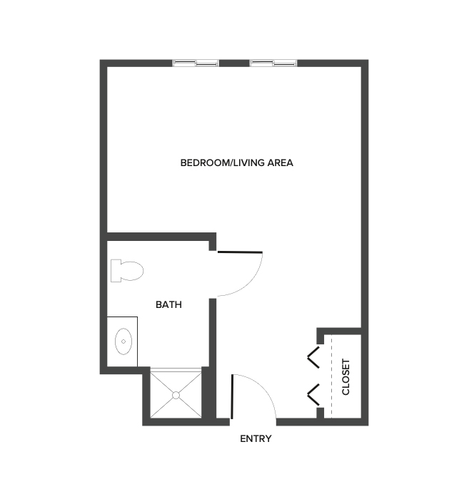 A memory care studio suite floor plan with an open living/bedroom space.