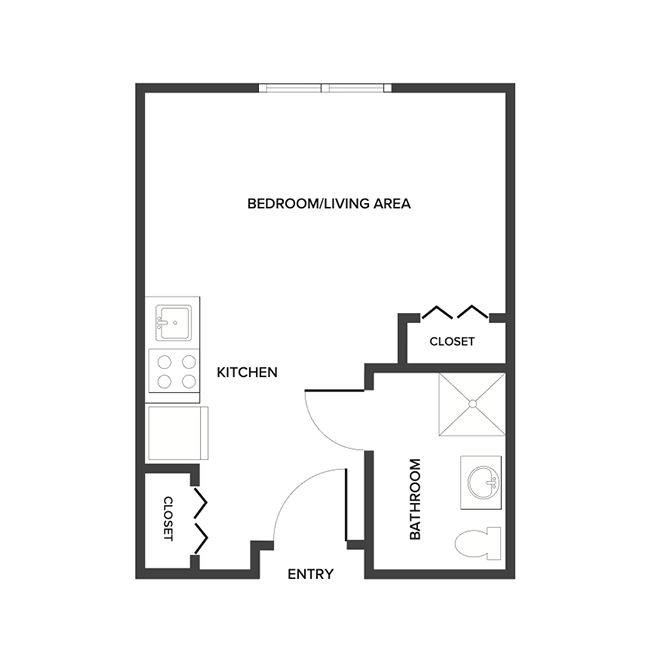 A studio suite floor plan with an open living/bedroom space and kitchenette.