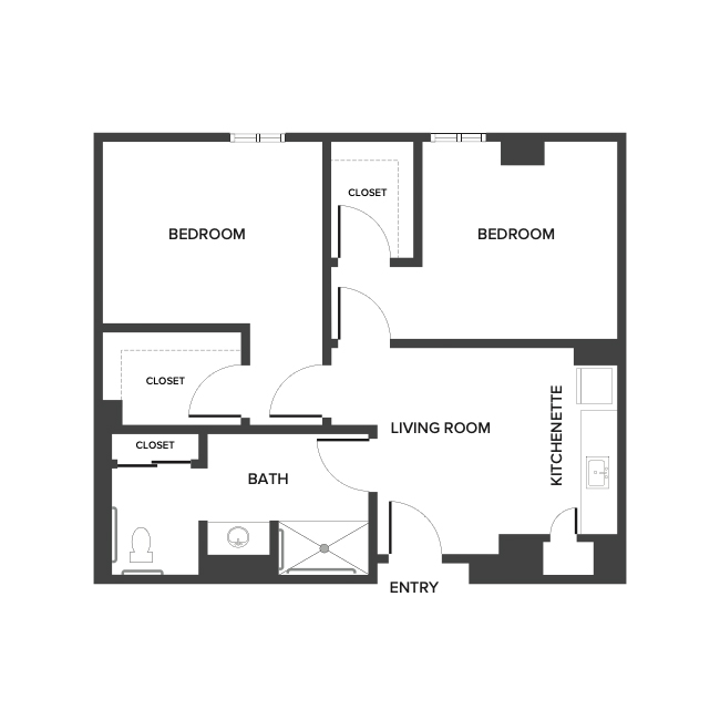 An assisted living suite floor plan with two bedrooms and approximately 1,130 square feet.