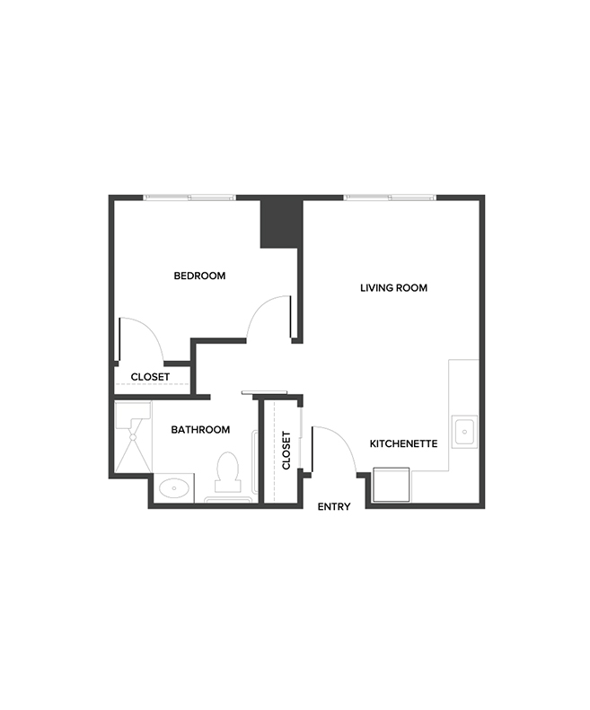 An assisted living suite floor plan with one bedroom and a bathroom.