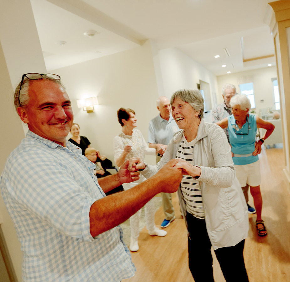 A group of people dancing.