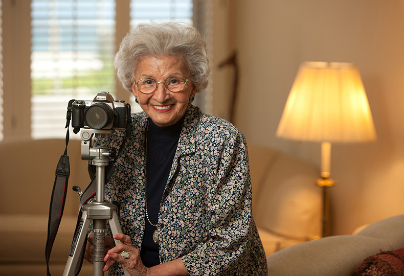 A resident is holding onto their camera.