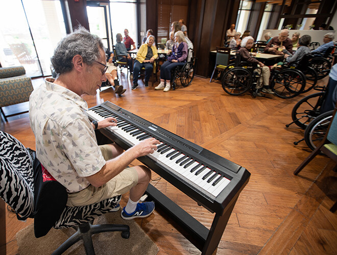 Resident playing keyboard.