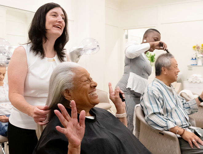 Couple getting their hair cut.