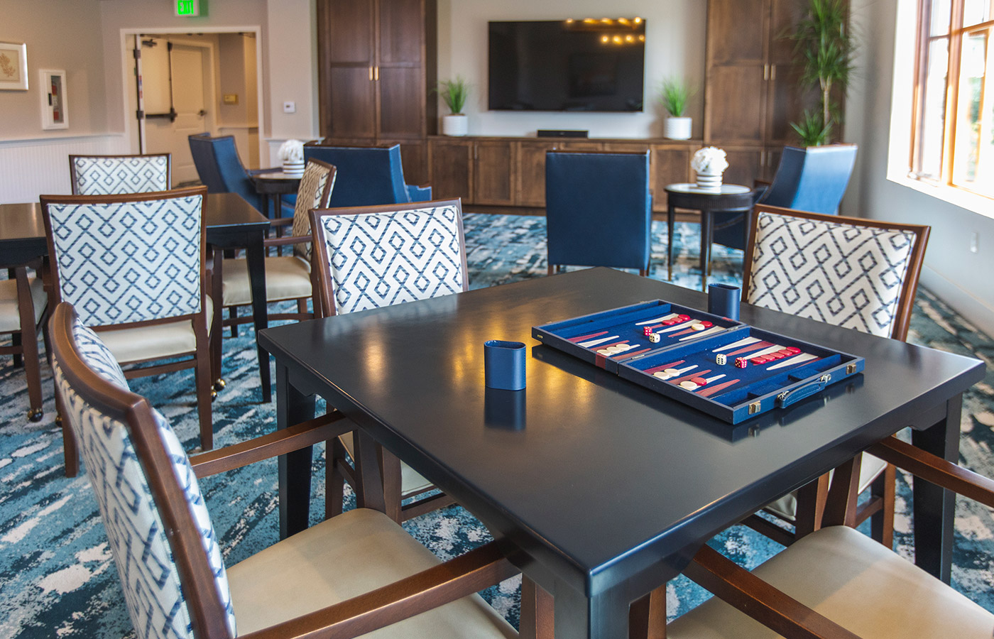 Table and game in a common area at Crown Cove.