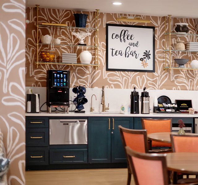 A cafe with a coffee and tea station.