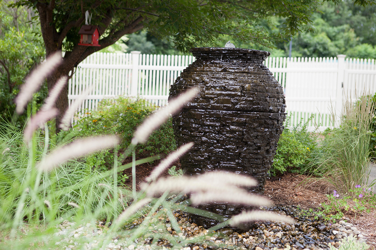 Large vase in garden at East Village Place.