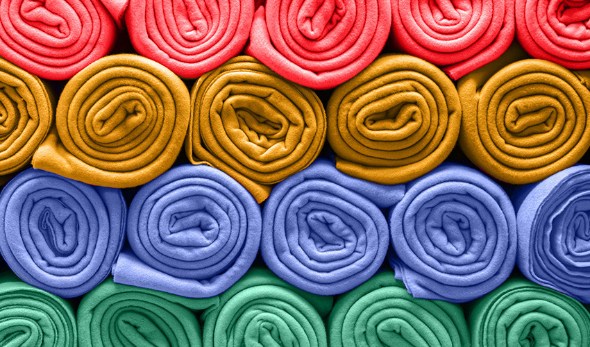 Rolls of colorful fleece fabric.