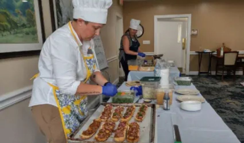 A chef is preparing food.