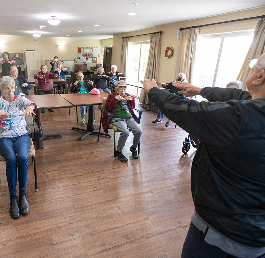 Residents are participating in a tai chi class.