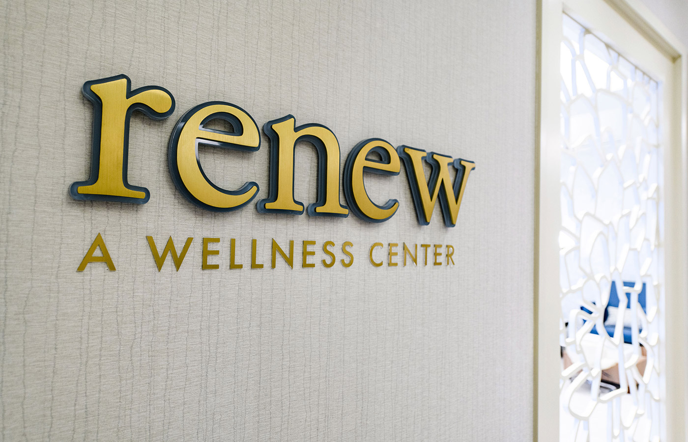 The Renew Wellness Center sign at The Watermark at Houston Heights.