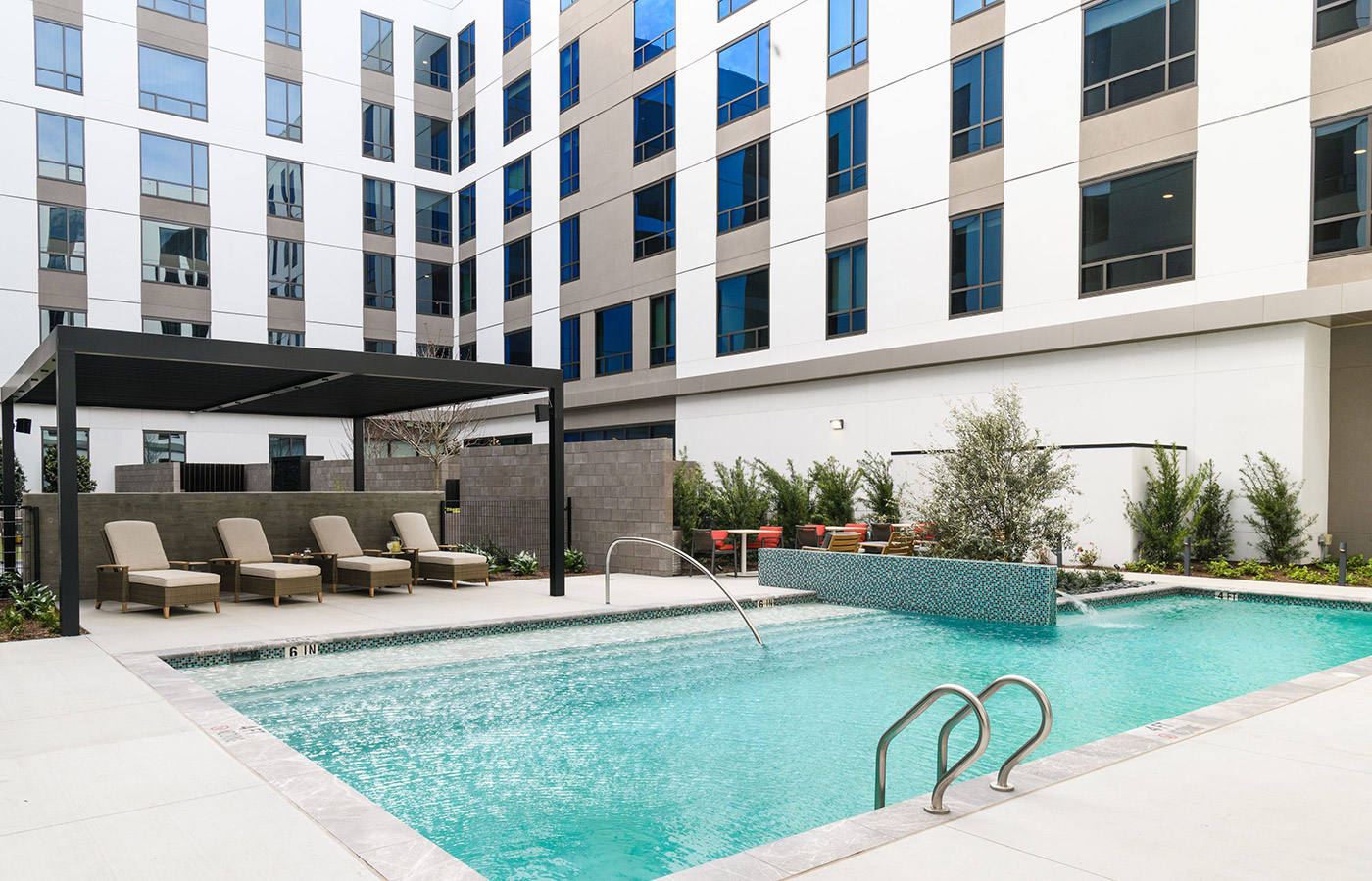 An outdoor pool area at The Watermark at Houston Heights.