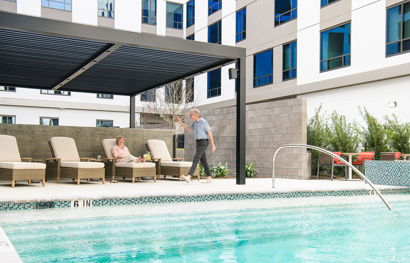 An outdoor pool area at The Watermark at Houston Heights.