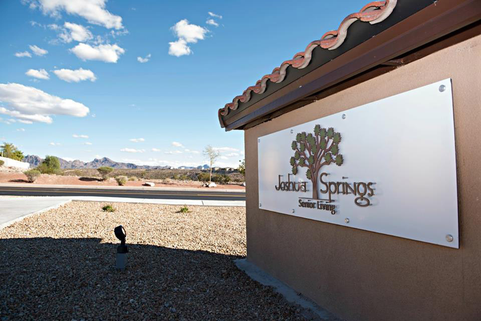 Joshua Springs Senior Living entrance sign outside.