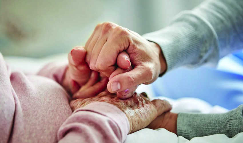 Two people holding hands.