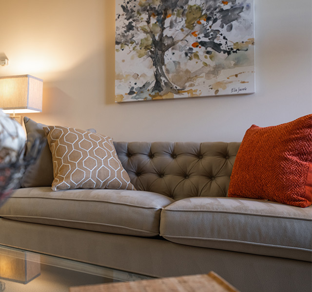 A gray sofa in living room.