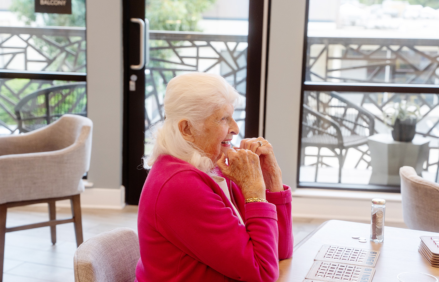 A person sitting smiling.