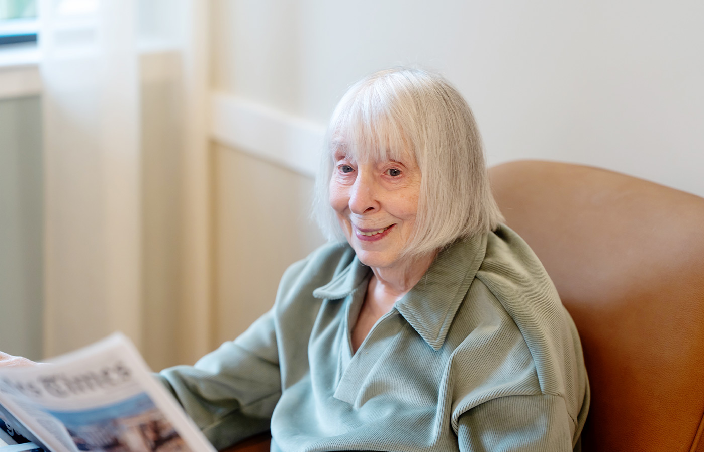 A person sitting in a chair.