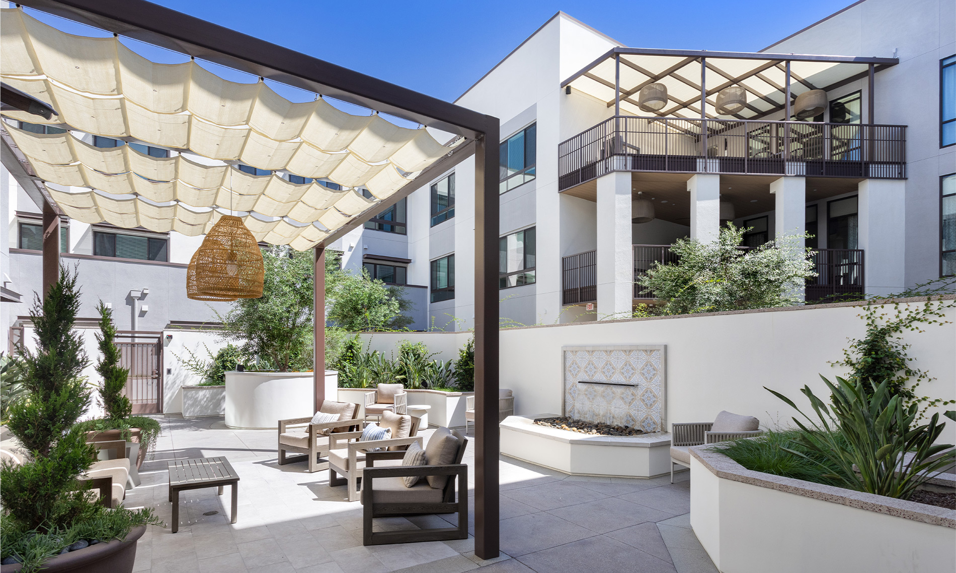 A modern courtyard with seating areas.