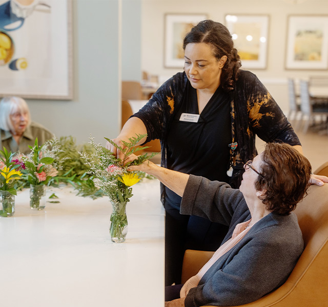 People arranging flowers.
