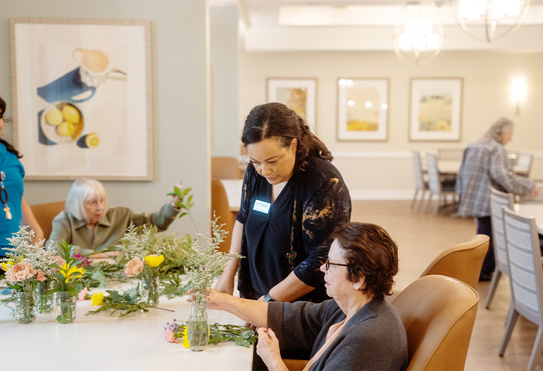 People arranging flowers.