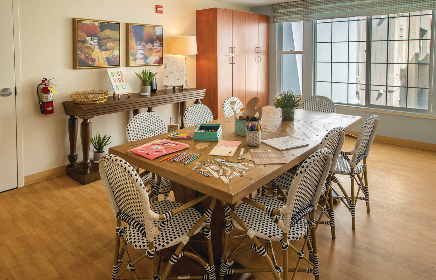 Activities Room with a seating area and games on top of the table.