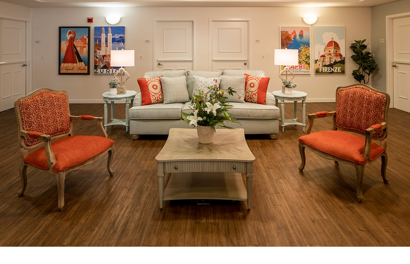 Family Room seating area with a sofa, chairs and coffee table