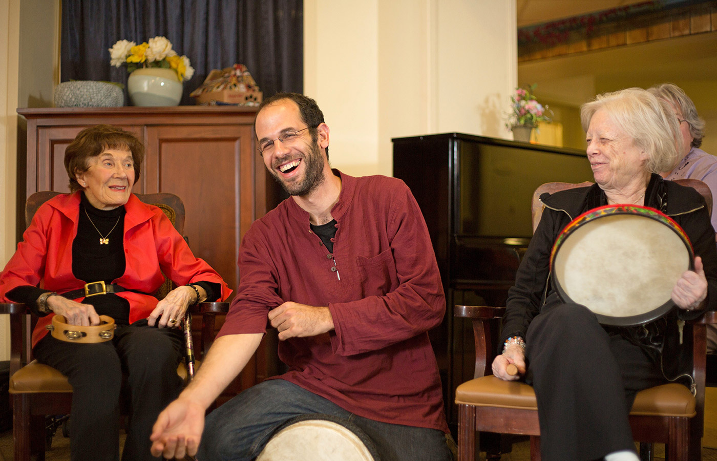 two residents and an associate playing instruments