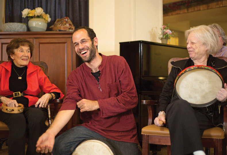 two residents and an associate playing instruments