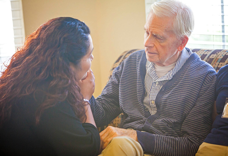 A resident with their caregiver.