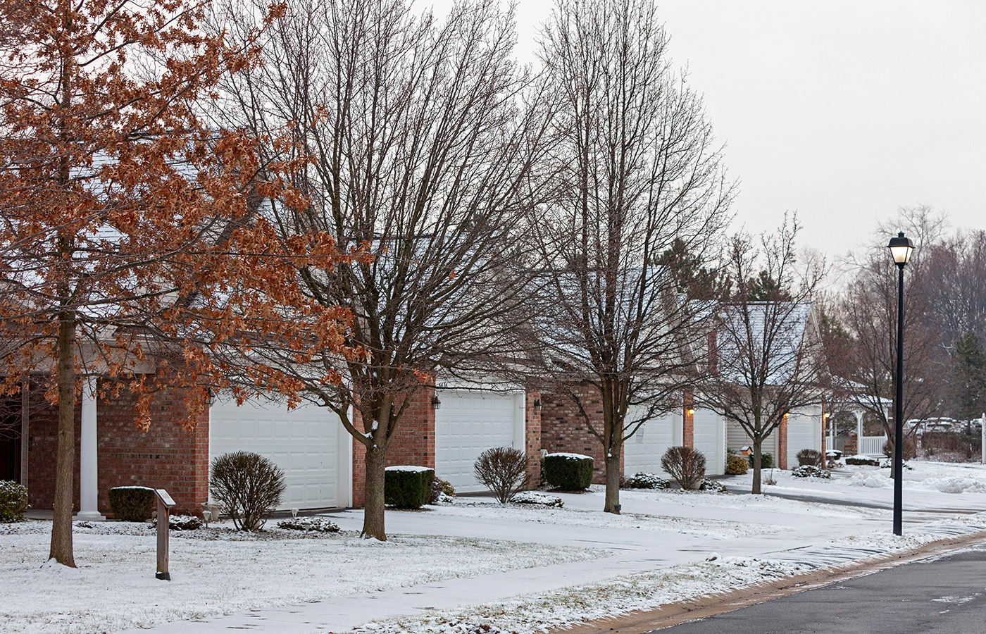 The exteriors of villas during winter at The Legacy at Park Crescent.