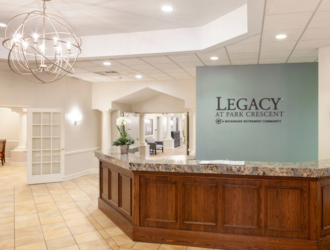 The front desk in the lobby at The Legacy at Park Crescent.