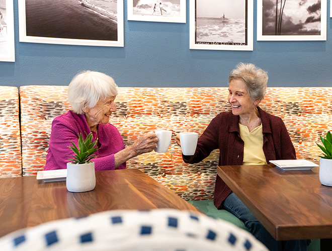 Two friends having coffee.