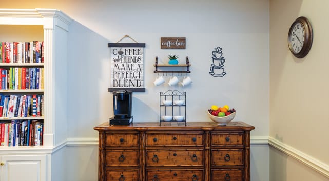 A coffee bar in the library at The Legacy at Fairways.