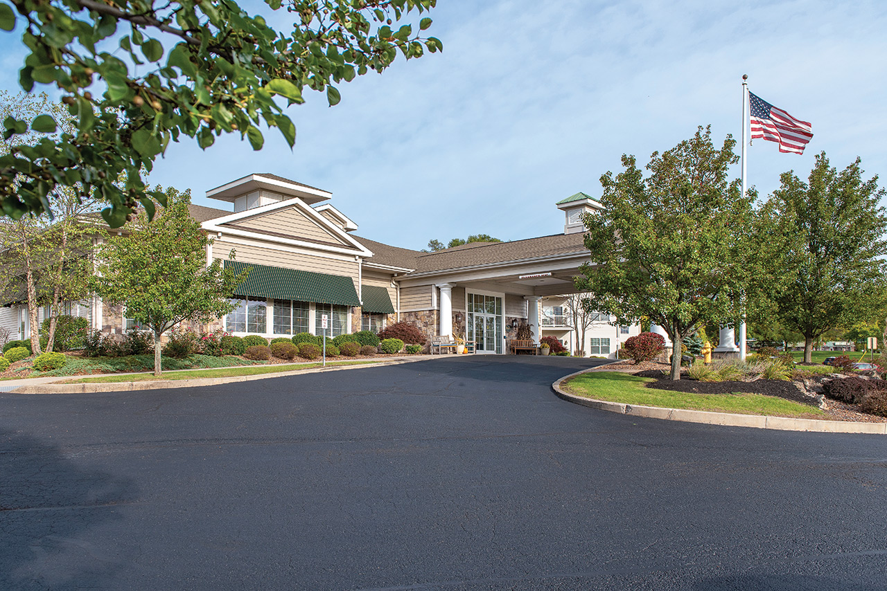 The exterior front entrance of The Legacy at Parklands.