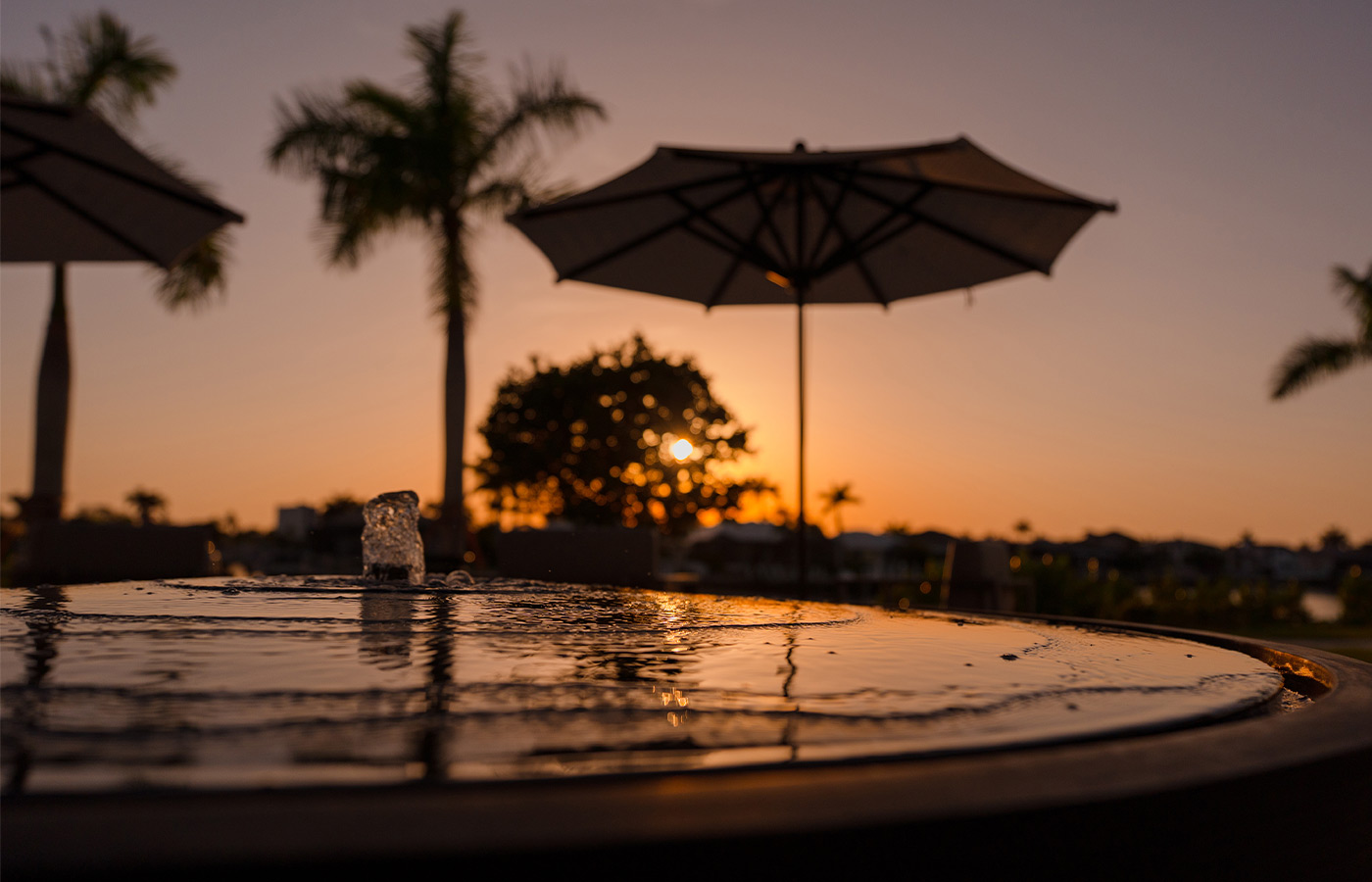 A fountain during sunset.