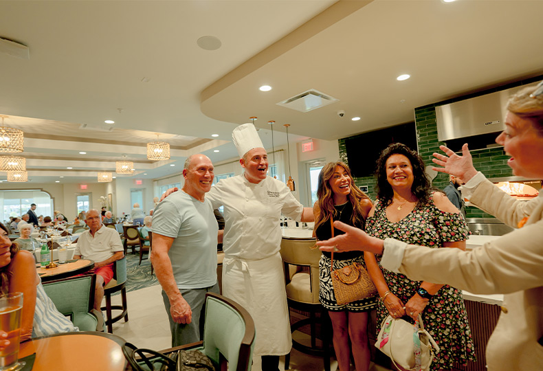 A group of people smiling.