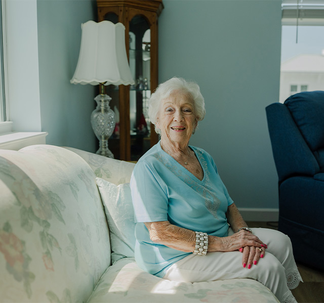 A person sitting on a couch.