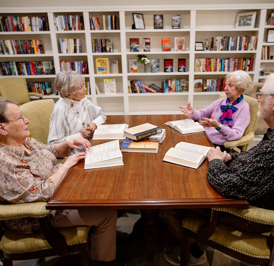 A group of people in a book club.