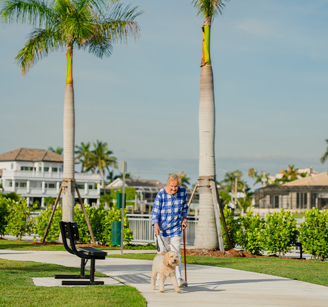 A person walking their dog.