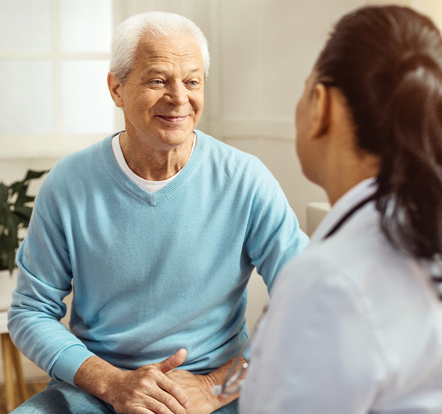 A person talking with a doctor.
