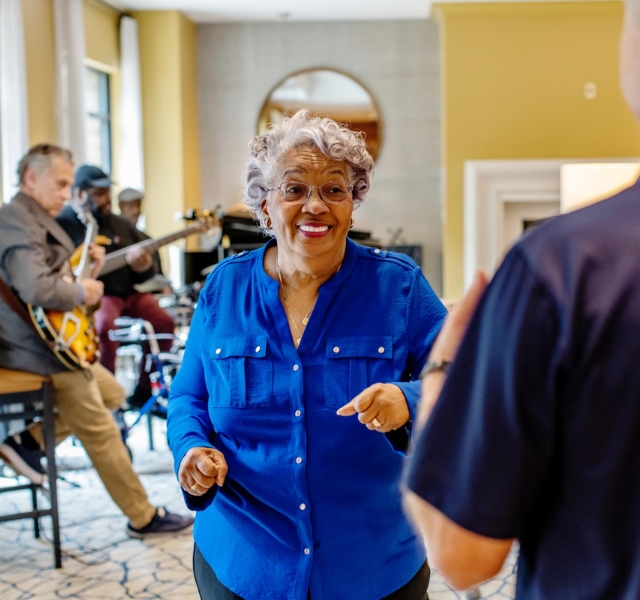 Resident dancing to life music.
